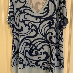 Tunic style shirt sleeved shirt with sheer base